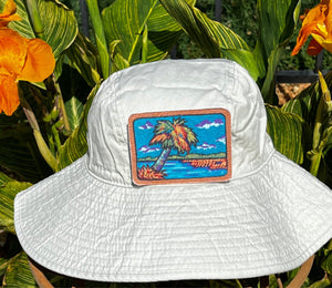 Rural Heart®️ by René Earnhardt “Palm Tree” bucket hat featuring original art
